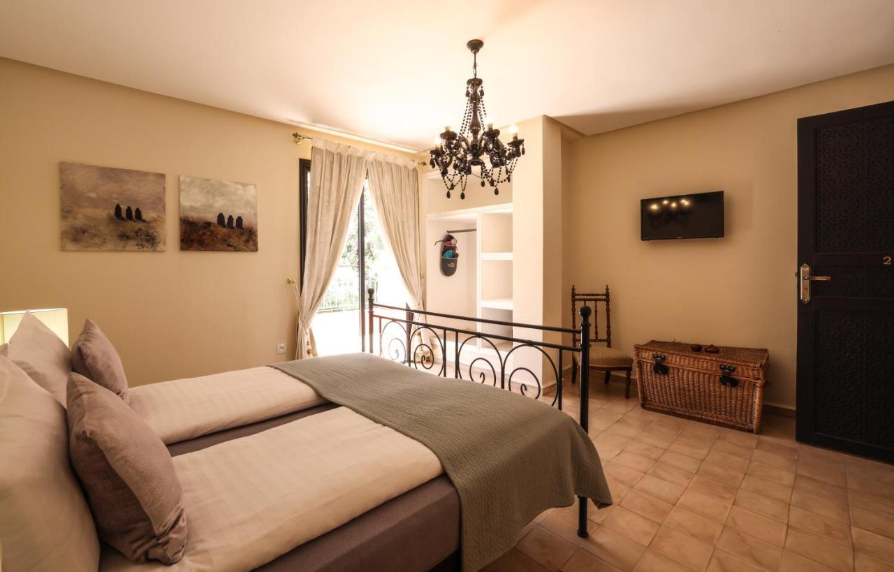 Tiguemine Sarah Hotel Douar Akkara Buitenkant foto