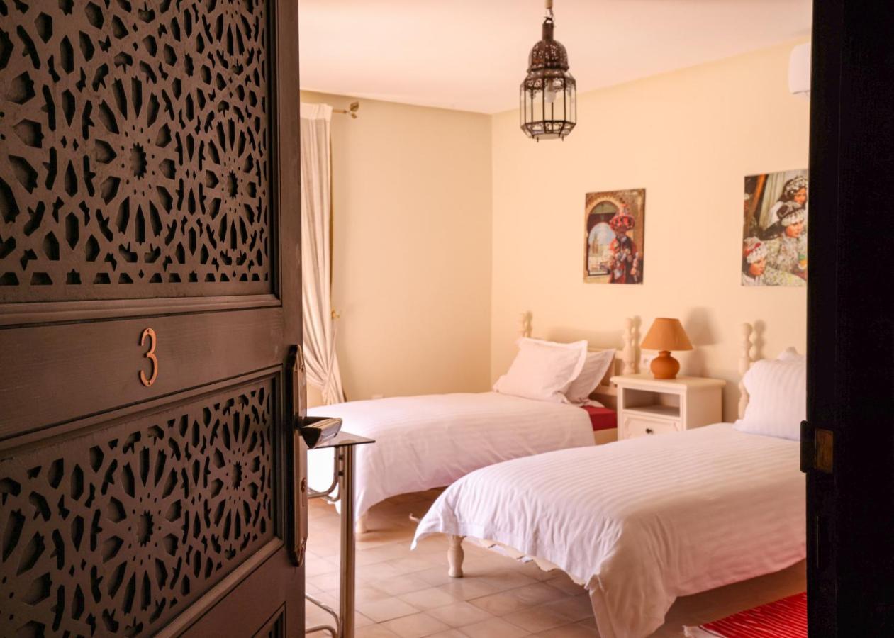 Tiguemine Sarah Hotel Douar Akkara Buitenkant foto